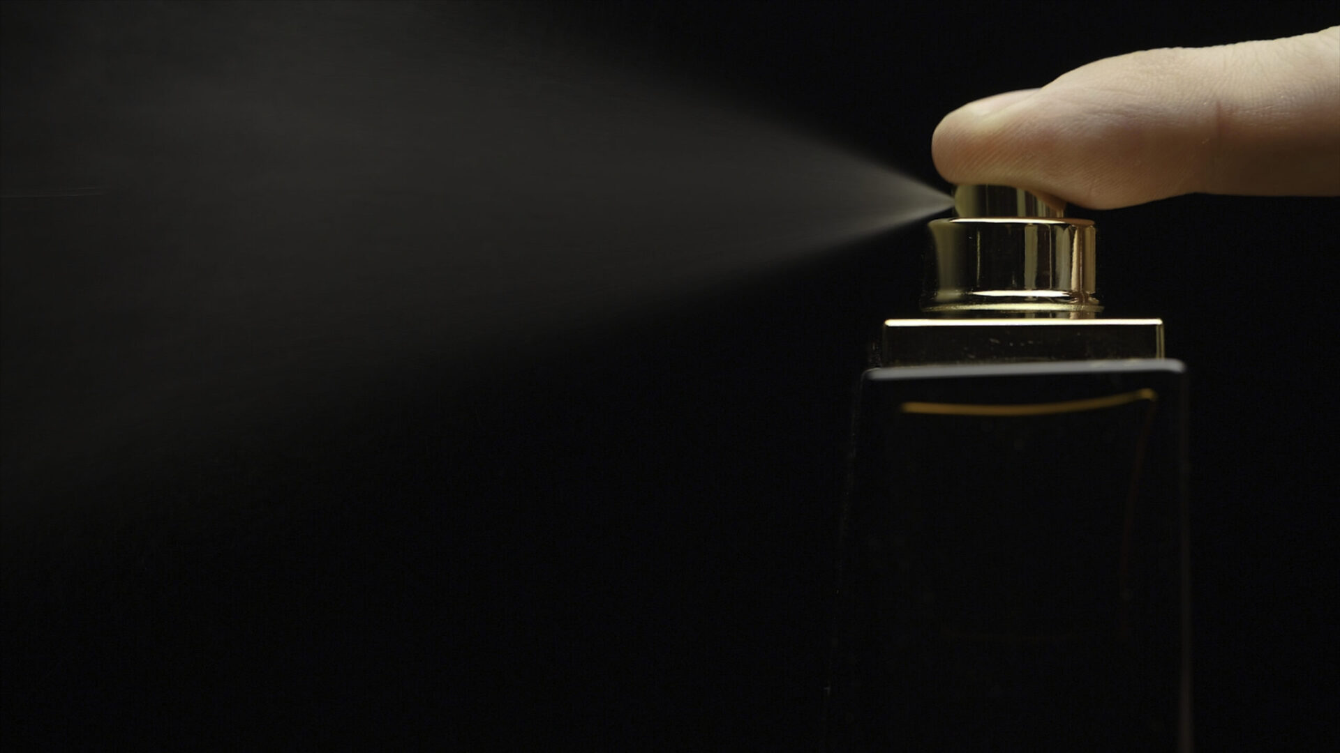 fragrance luxury bottle contents in dark spraying 2023 11 27 05 30 17 utc scaled