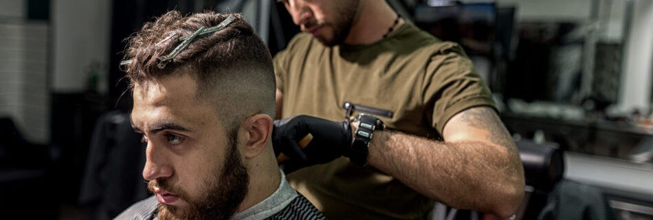 brutal man sits in the chair at a barber shop bar 2024 09 16 11 09 57 utc scaled