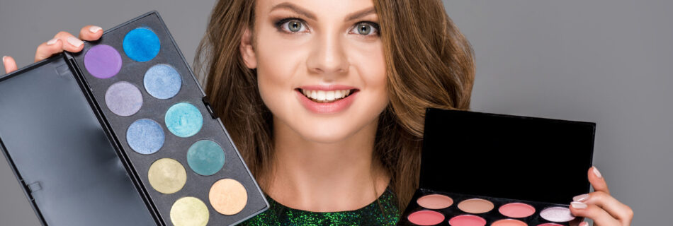 portrait of smiling woman with eyeshadows palettes 2024 11 09 09 09 50 utc scaled