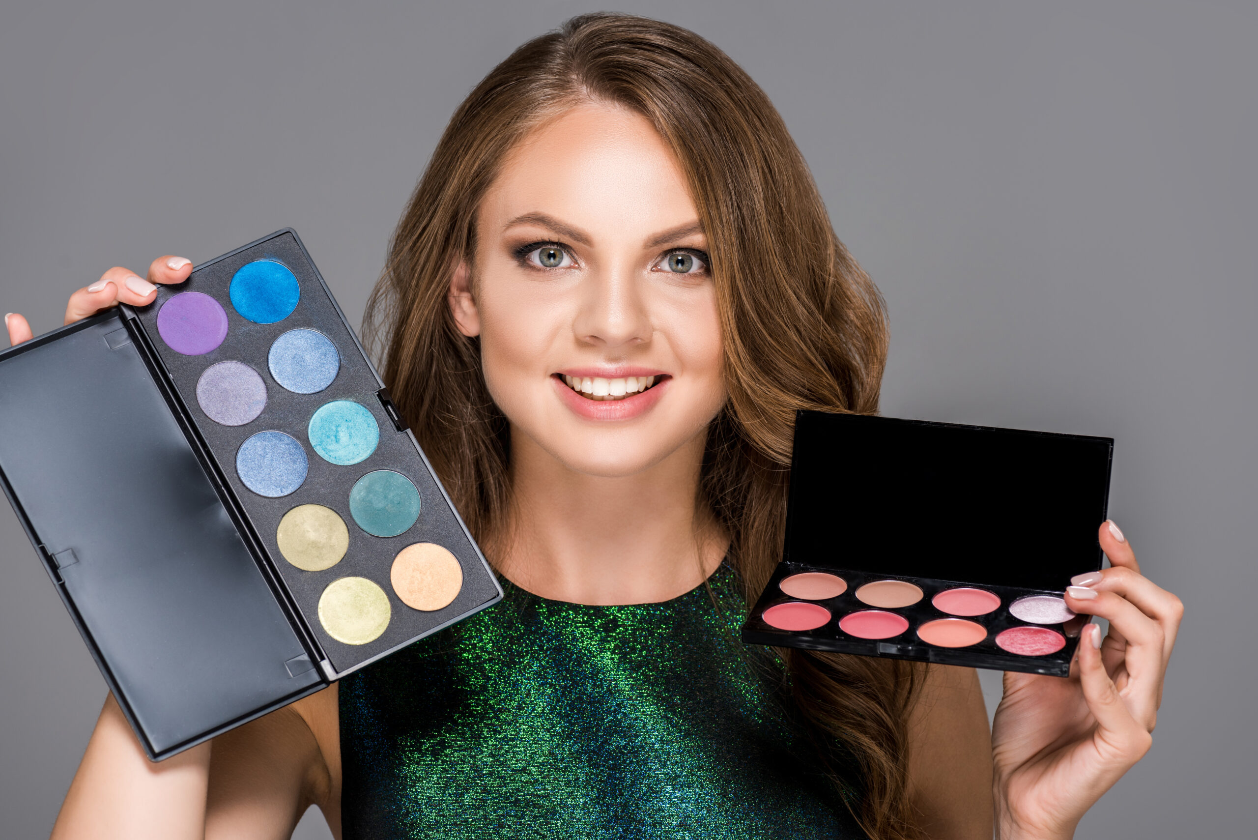 portrait of smiling woman with eyeshadows palettes 2024 11 09 09 09 50 utc scaled